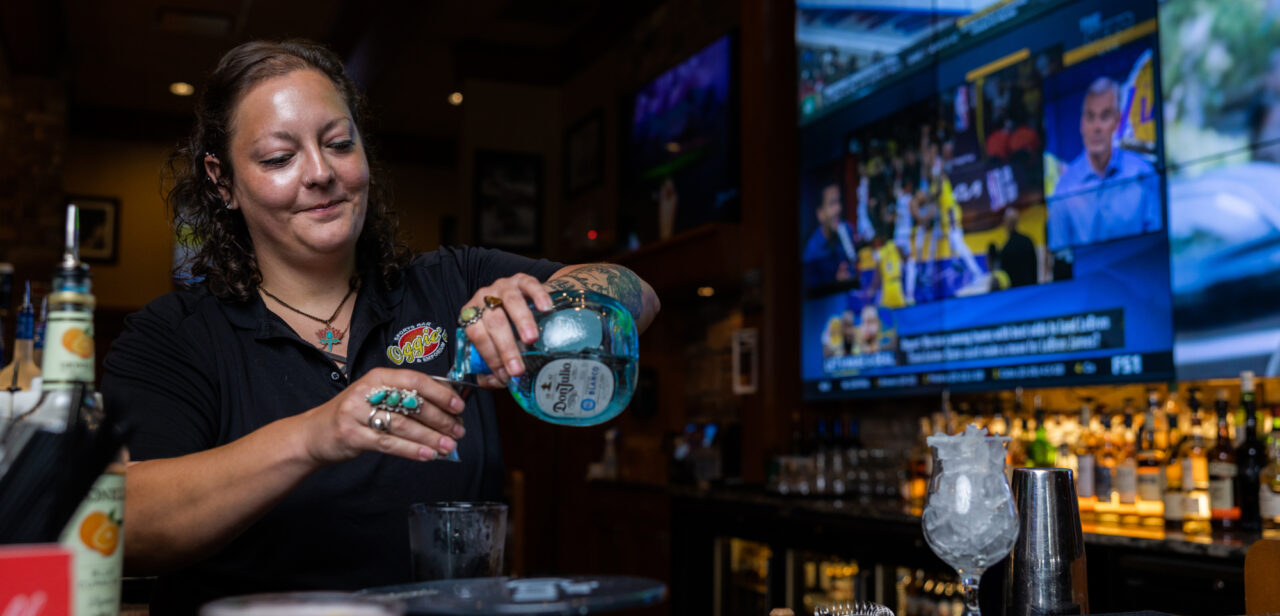 Bartender pouring a drink