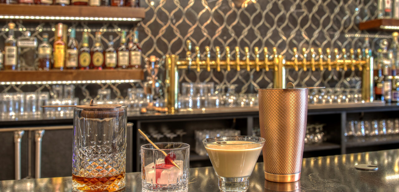 An Image of two speciality cocktails at Preacher Smith's Taprooms & Commons