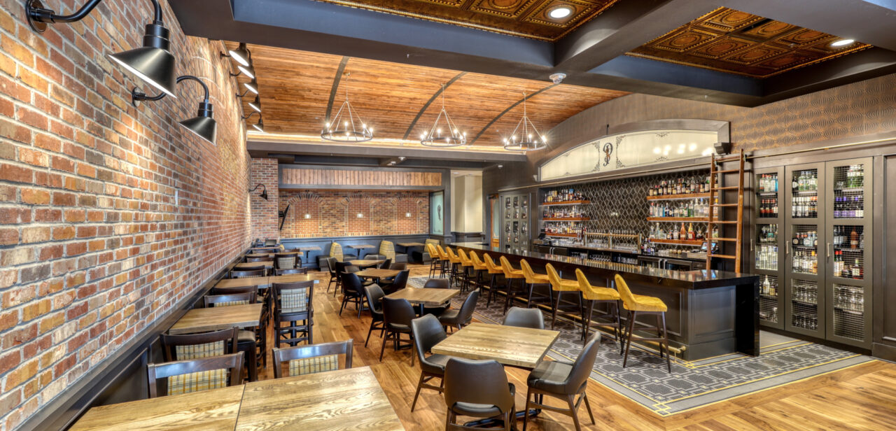 An image of the full bar and seating are at Preacher Smith's Taproom and Commons